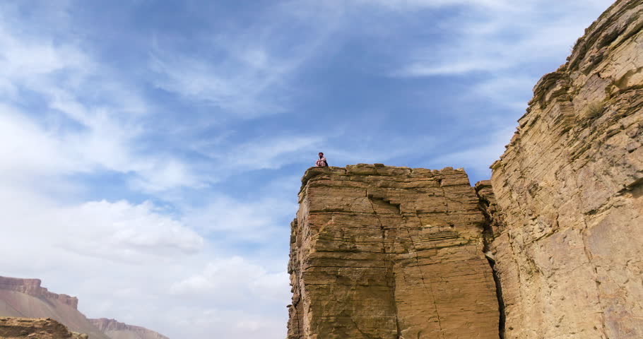 Band-E Amir Lake With Man On Top Of A Cliff In Bamyan Province, Afghanistan - Drone Shot