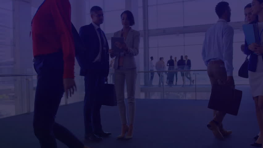 business professionals holding tablet and files in corporate atrium, showing hologram data overlays. Technology, collaboration, innovation, networking, futurism, corporate, data visualization - Powered by Shutterstock - Get 15% off with code: PIKWIZARD15