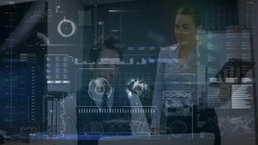 Two colleagues analyzing business data interface in office, showing floating graphs and world map. Futuristic, innovation, technology, collaboration, analytical, corporate, digital - Powered by Shutterstock - Get 15% off with code: PIKWIZARD15