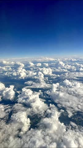 Aerial View, Airplane Window, Sky Scenery, In-flight View, Above Clouds, Window Seat, Sky Horizon, Flight View, Airplane Scenery, Sky Panorama, Aerial Scenery, Cloudscape View, Vertical