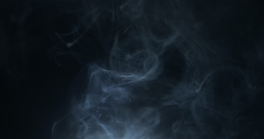 Ambient, abstract smoke and light motion background. Strange, glowing, alien, UFO light, ghost or spirit with smoke and fog for halloween or science fiction, sci-fi background.