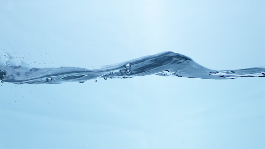 Liquid Tranquility Smooth Flowing Water Surface in Slow Motion.