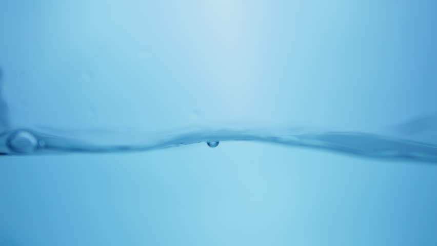 Magnificent water movement in super slow motion in a horizontal line