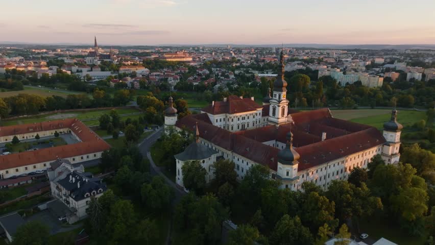 Aerial panorama of Olomouc city. Historic military hospital monastery at sunset in summer. Czech Republic, Moravia