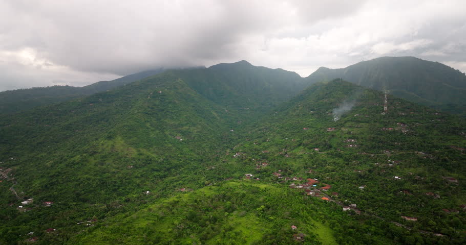 Lush Forests And Mountaintop Houses Near Amed In North Bali, Indonesia. Aerial Drone Shot