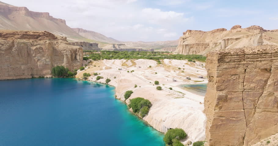 Aerial View Of Man On Top Of A Cliff In Band-e Amir National Park In Bamyan Province Of Afghanistan - Drone Shot