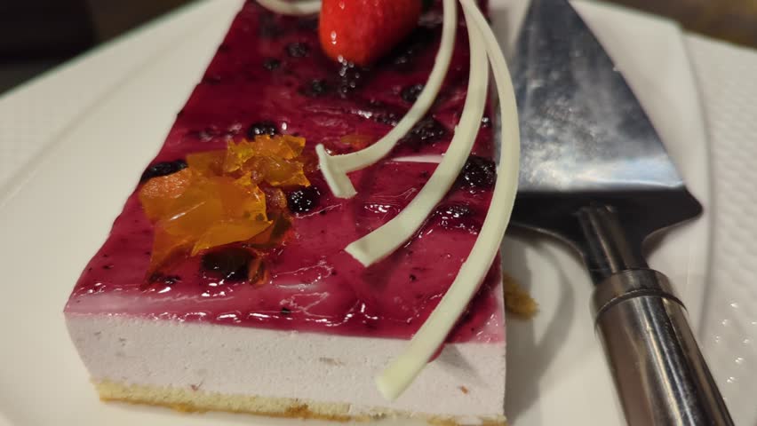 Elegant Slice of Pastel de Nata with Blueberries and Strawberry