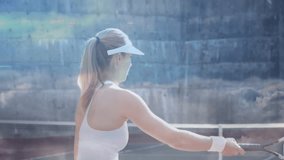 female tennis player with visor swinging racket hitting ball on court, showcasing network icons. Athlete, sports, outdoor, fitness, connectivity, digital, modern - Powered by Shutterstock - Get 15% off with code: PIKWIZARD15