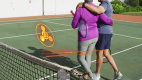 man wrapping arm around woman walking on tennis court, showing red augmented reality fitness alert. Athletics, companionship, vitality, technology, outdoor, active lifestyle, wellness - Powered by Shutterstock - Get 15% off with code: PIKWIZARD15