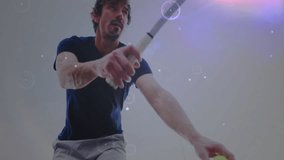 Mature male athlete swinging racket in studio, showing animated sports analytics circles and lines. Athlete, technology, sport, fitness, data, motion, digital - Powered by Shutterstock - Get 15% off with code: PIKWIZARD15