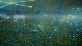 Digital tennis ball being animated on green court, showing glowing network nodes and circular HUD. Sport, technology, digital, futuristic, connectivity, innovation, fitness - Powered by Shutterstock - Get 15% off with code: PIKWIZARD15