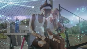 Two teammates holding smartphone and water bottle by court bench, sharing health data with graphs. Athletic, friendship, hydration, outdoor, vitality, teamwork, casual - Powered by Shutterstock - Get 15% off with code: PIKWIZARD15