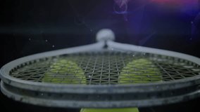 Tennis ball cluster being highlighted on glossy surface, featuring metal racket and HUD graphics. Sports equipment, futuristic, digital interface, technology, performance, training, modern - Powered by Shutterstock - Get 15% off with code: PIKWIZARD15