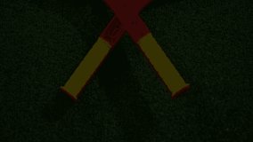 Red paddle rackets forming V shape on green turf while glitch lines, skull and code scrolling. Sport equipment, digital art, modern design, esports, vibrant, gaming, technological - Powered by Shutterstock - Get 15% off with code: PIKWIZARD15