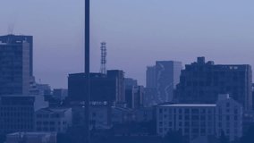 Smokestack with tower being animated rising above skyline, purple circuit lines streaking in 3D. Urban, skyline, technology, futurism, digital, industrial, modern - Powered by Shutterstock - Get 15% off with code: PIKWIZARD15