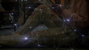 woman using smartphone on warehouse floor, showing glowing technology connectivity overlay. Technology, networking, connectivity, urban, modern, digital, innovation - Powered by Shutterstock - Get 15% off with code: PIKWIZARD15