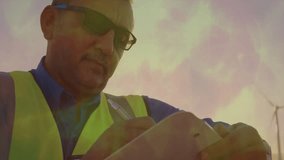 man wearing safety vest reviewing finance data overlay, showing animated bar charts and lens flares. Professional, analytics, modern, corporate, technological, financial, digital - Powered by Shutterstock - Get 15% off with code: PIKWIZARD15