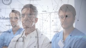 Medical professionals analyzing patient data in hospital corridor, showing digital network graphics. Healthcare, collaboration, digital, analytics, innovation, professionalism, technology - Powered by Shutterstock - Get 15% off with code: PIKWIZARD15
