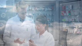 Two pharmacists examining medicine vial in pharmacy lab, showcasing digital network overlays. Scientists, research, collaboration, innovation, biotechnology, medical, pharmaceutical - Powered by Shutterstock - Get 15% off with code: PIKWIZARD15