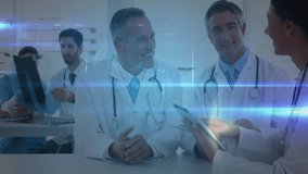 Medical team discussing X-ray data using tablet in clinic with animated network icons. Healthcare, collaboration, technology, innovation, professionalism, diagnostics, network - Powered by Shutterstock - Get 15% off with code: PIKWIZARD15