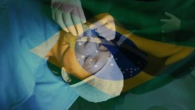 female patient lying on surgical table, doctor adjusting mask tubing, with Brazilian flag overlay. Medical, healthcare, surgical, anesthesia, sterile, clinical, hospital - Powered by Shutterstock - Get 15% off with code: PIKWIZARD15