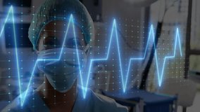 Nurse wearing scrubs and mask monitoring patient data in hospital, with neon-blue ECG overlay. Medical, healthcare, clinical, diagnostic, technology, professional, hospital - Powered by Shutterstock - Get 15% off with code: PIKWIZARD15