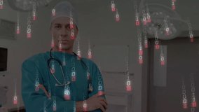 Male doctor wearing teal scrubs crossing arms in operating room, showing floating binary code. Medical, healthcare, technology, innovation, clinical, diagnostics, hospital - Powered by Shutterstock - Get 15% off with code: PIKWIZARD15