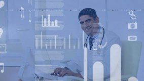 Male doctor sitting at desk typing on laptop in medical office, showcasing floating health charts. Healthcare, telemedicine, digital health, informatics, professional, technology, analysis - Powered by Shutterstock - Get 15% off with code: PIKWIZARD15