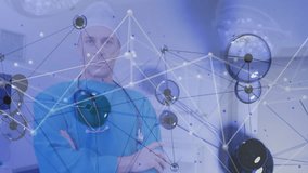 Doctor using medical monitors in clinical room, integrating health technology with network overlay. Healthcare, telemedicine, innovation, biomedical, digital, technology, professionalism - Powered by Shutterstock - Get 15% off with code: PIKWIZARD15