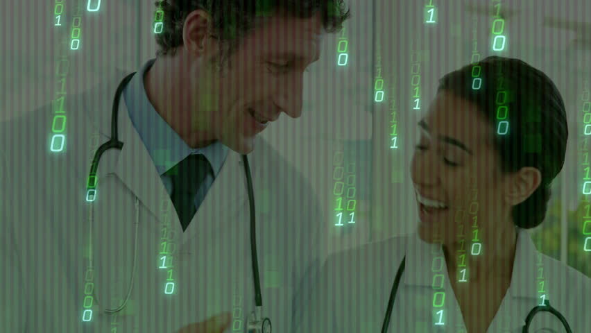 Female doctor holding tablet and male doctor standing, integrating binary code overlay for health. Medical, collaboration, technology, digital, innovation, healthcare, professional - Powered by Shutterstock - Get 15% off with code: PIKWIZARD15