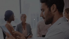 Man using tablet in modern business technology meeting, interacting with digital network overlay. Digital connectivity, collaboration, innovation, tech-savvy, professional workspace, futuristic, - Powered by Shutterstock - Get 15% off with code: PIKWIZARD15