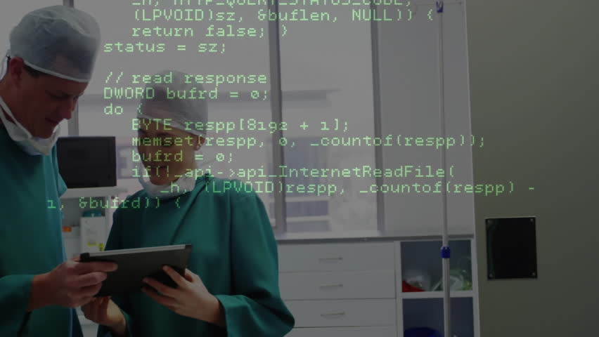 male doctor holding tablet while female doctor reviewing code overlay in health tech hospital. Medical, collaboration, futuristic, innovation, healthcare, technology, teamwork