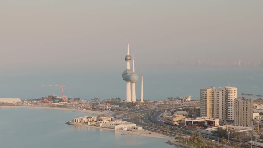 Kuwait Towers which are a group of three slender towers in Kuwait City, standing on a promontory into the Persian Gulf