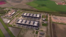Futuristic data complex with server halls in the Netherlands. Aerial drone video - Powered by Shutterstock - Get 15% off with code: PIKWIZARD15
