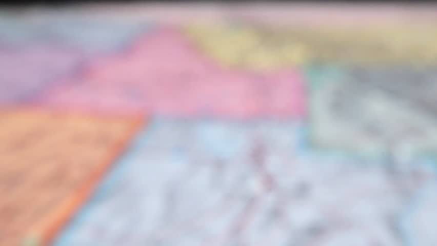 Salt Lake City On Printed Map - Known For Skiing And Snowboarding In Utah, USA. - rack focus, zoom-in shot