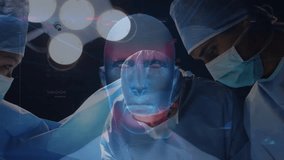 Surgeons operating in operating room under surgical lights, with animated HUD graphs plus readouts. Medical, surgical, high-tech, teamwork, healthcare, innovation, precision - Powered by Shutterstock - Get 15% off with code: PIKWIZARD15