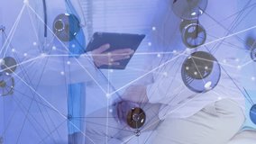 Two female doctors with stethoscopes reviewing tablet data in clinic, with digital network overlay. Medical, healthcare, technology, collaboration, innovation, professional, futurism - Powered by Shutterstock - Get 15% off with code: PIKWIZARD15