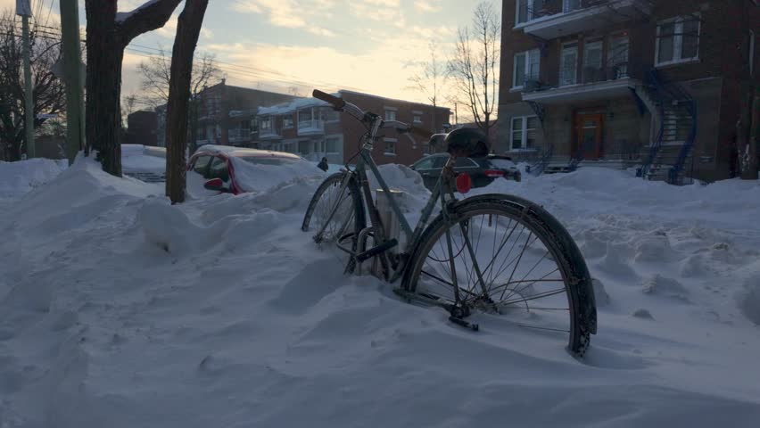 Bicycle abandoned under the winter snow, Vieux-Rosemont, Montreal
