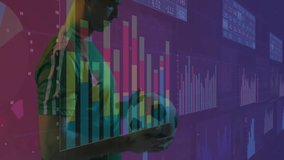 Male soccer player holding ball and analyzing data in tech studio, showing finance graphs. Athletic, digital, futuristic, analytical, performance, innovation, equipment - Powered by Shutterstock - Get 15% off with code: PIKWIZARD15