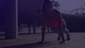 Female athlete performing push-up outdoors at night, showing fitness data panels and neon graphs. Athlete, fitness, technology, futuristic, training, innovation, performance - Powered by Shutterstock - Get 15% off with code: PIKWIZARD15