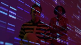 Two colleagues holding white sphere in technology studio, featuring neon glitch projections. Futuristic, cyberpunk, artistic, innovation, collaboration, digital art, vibrant - Powered by Shutterstock - Get 15% off with code: PIKWIZARD15