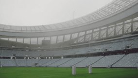 Open-air stadium being animated with floating UI labels moving across goal posts and green field. Stadium, sports, data visualization, technology, digital interface, outdoor, architecture - Powered by Shutterstock - Get 15% off with code: PIKWIZARD15