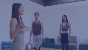 Instructor guiding students in fitness studio showing floating holographic panels over yoga mats. Athletic, trainer, technology, motion, concentration, wellness, innovation - Powered by Shutterstock - Get 15% off with code: PIKWIZARD15