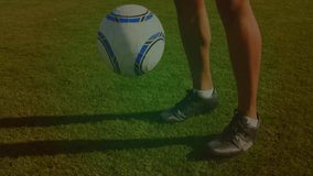 Male soccer player controlling soccer ball on grass, showing sports science with DNA helix graphics. Athletic, competition, motion, energy, technology, sportswear, fitness - Powered by Shutterstock - Get 15% off with code: PIKWIZARD15