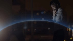 Businessman wearing shirt and tie analyzing holographic globe and data graphs in tech workspace. Futuristic, innovation, digital, technology, analytics, workspace, corporate - Powered by Shutterstock - Get 15% off with code: PIKWIZARD15
