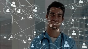 Male healthcare professional standing by city window, displaying network icons linking patient data. Medical, connectivity, futuristic, professionalism, urban, technology, collaboration - Powered by Shutterstock - Get 15% off with code: PIKWIZARD15