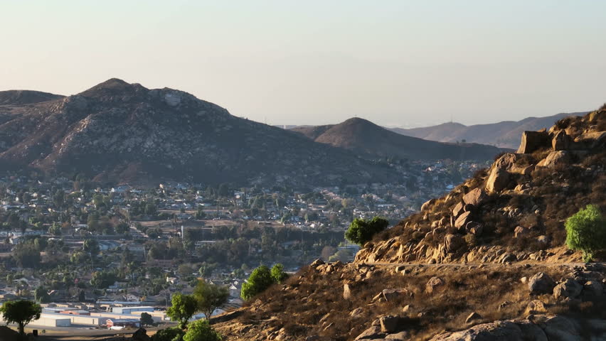 Telephoto drone shot around mount Rubidoux, golden hour in Riverside, CA, USA