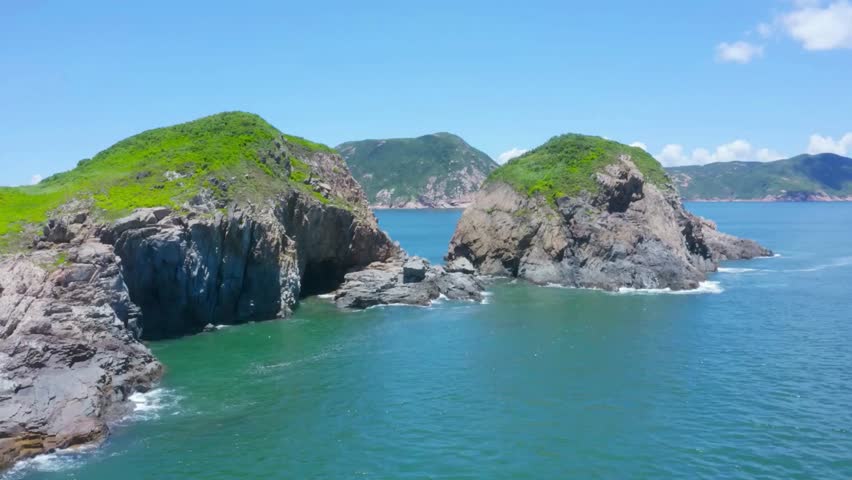 Panoramic View of Coastal Rock Formations and Ocean