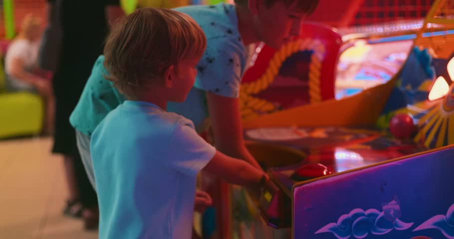 Kids Playing Ball Game at Arcade