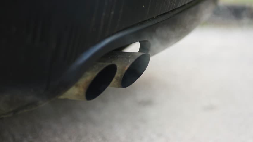 Pipe exhaust car smoke emission air pollution, slow motion